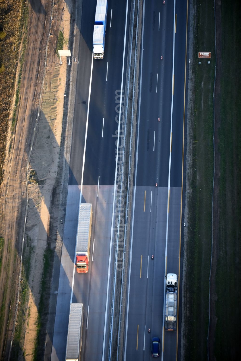 Spreenhagen from above - Highway construction site for the expansion and extension of track along the route of A12 E30 an unterschiedlichen Fahrbahn- Belag- Anschlussstellen in Spreenhagen in the state Brandenburg