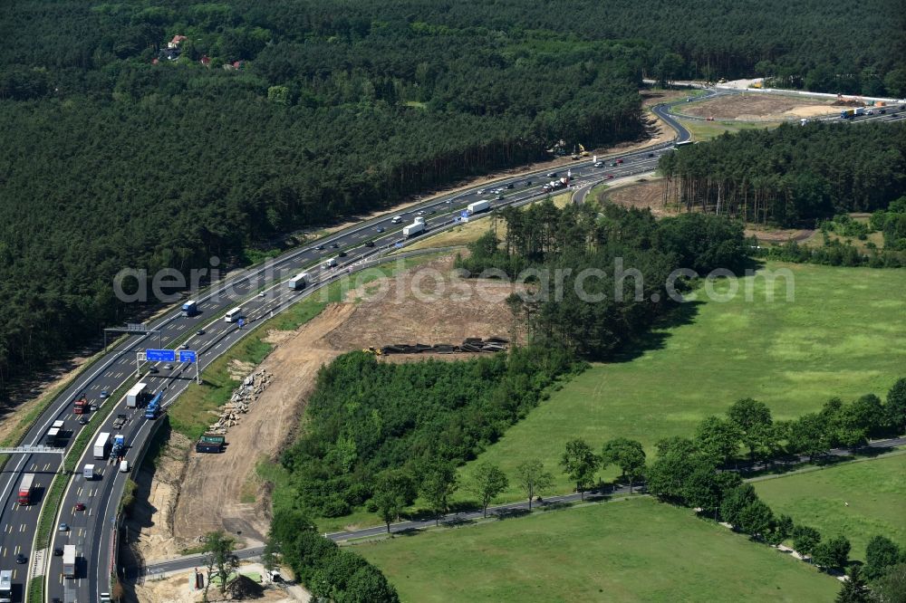 Michendorf from the bird's eye view: Motorway Construction and wheel spacers along the route of the motorway A10 to 8-lane track extension in Michendorf in Brandenburg