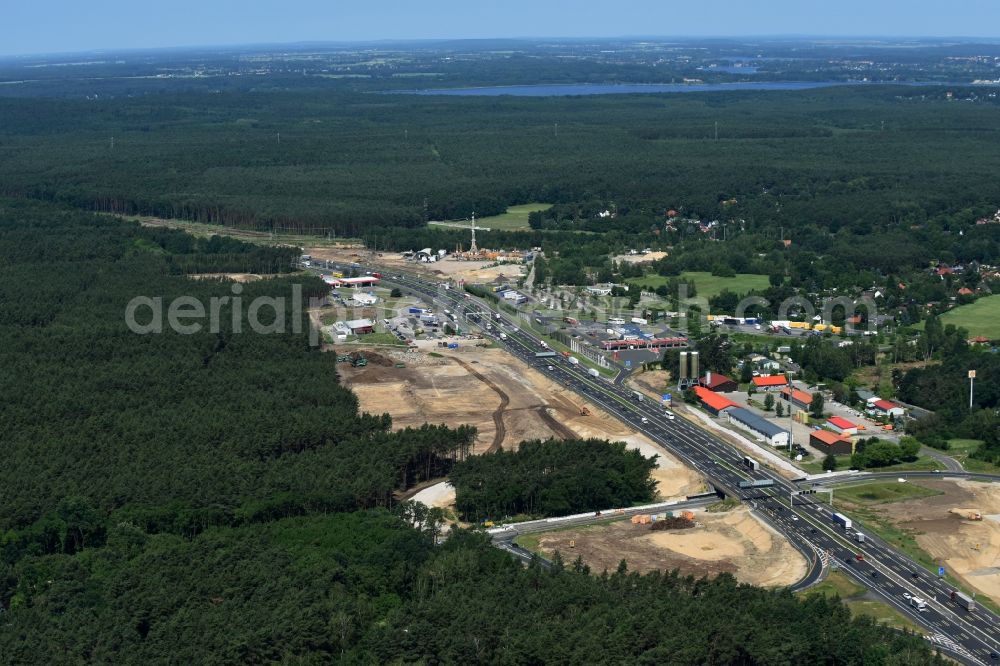 Michendorf from the bird's eye view: Motorway Construction and wheel spacers along the route of the motorway A10 to 8-lane track extension in Michendorf in Brandenburg