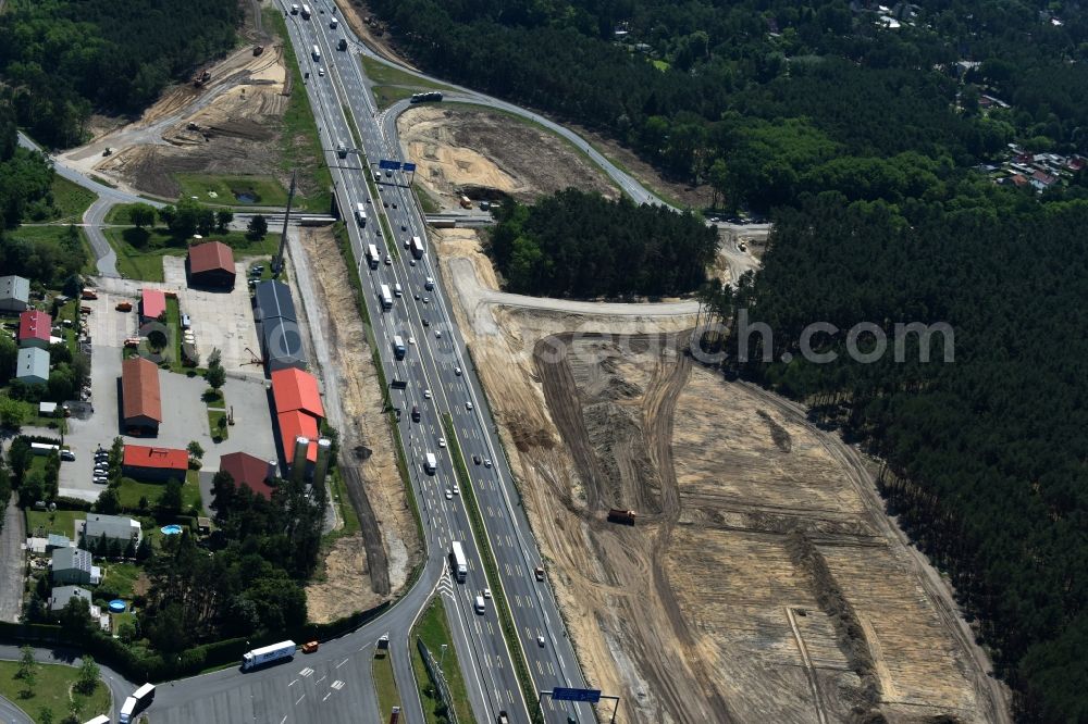 Michendorf from the bird's eye view: Motorway Construction and wheel spacers along the route of the motorway A10 to 8-lane track extension in Michendorf in Brandenburg