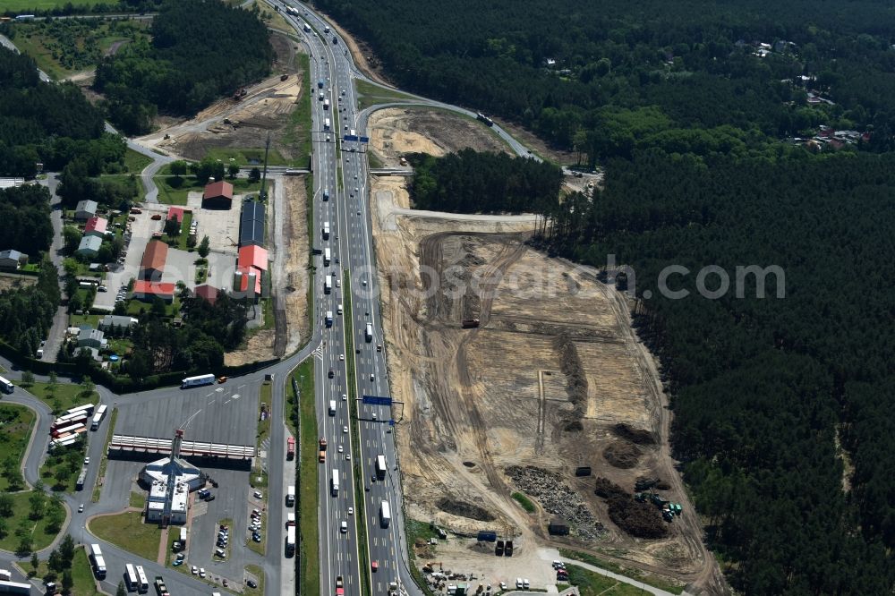 Michendorf from above - Motorway Construction and wheel spacers along the route of the motorway A10 to 8-lane track extension in Michendorf in Brandenburg