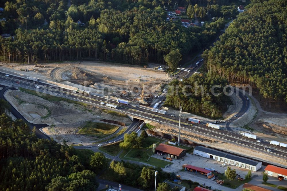 Michendorf from the bird's eye view: Motorway Construction and wheel spacers along the route of the motorway A10 to 8-lane track extension in Michendorf in Brandenburg