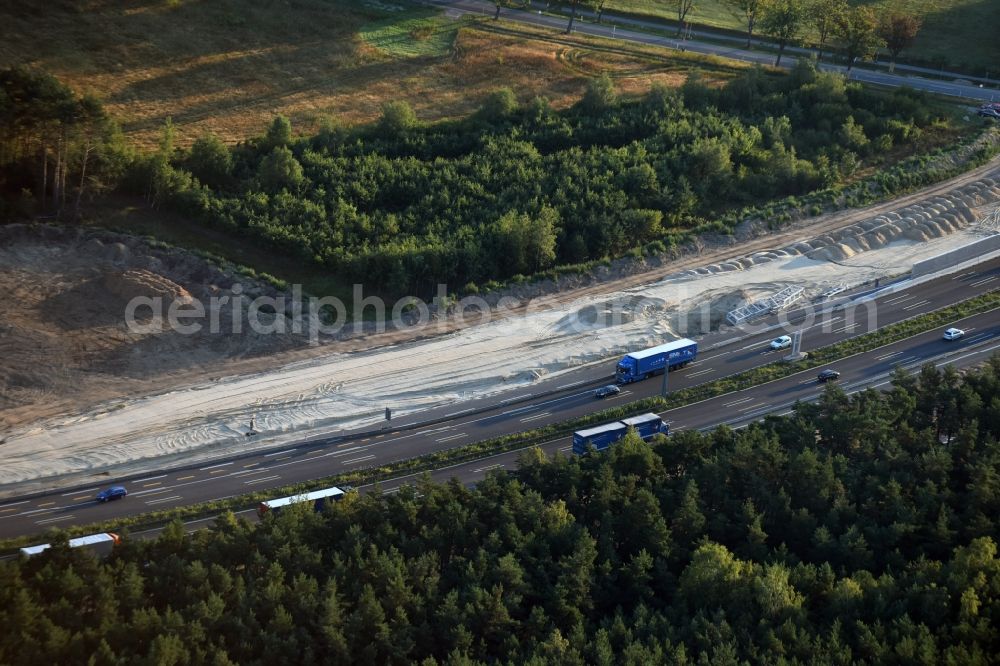 Michendorf from the bird's eye view: Motorway Construction and wheel spacers along the route of the motorway A10 to 8-lane track extension in Michendorf in Brandenburg