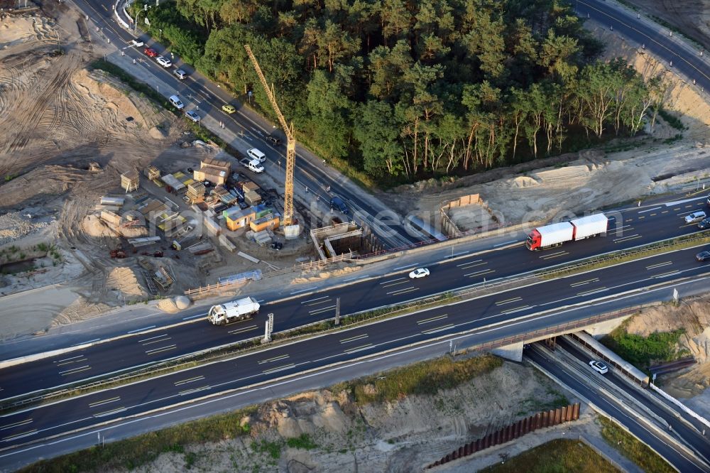 Michendorf from the bird's eye view: Motorway Construction and wheel spacers along the route of the motorway A10 to 8-lane track extension in Michendorf in Brandenburg