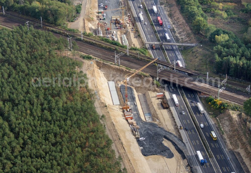 Michendorf from the bird's eye view: Motorway Construction and wheel spacers along the route of the motorway A10 to 8-lane track extension in Michendorf in Brandenburg