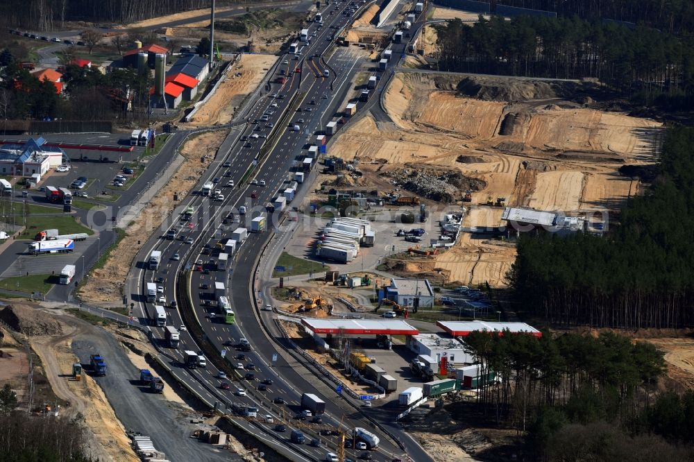 Michendorf from above - Motorway Construction and wheel spacers along the route of the motorway A10 to 8-lane track extension in Michendorf in Brandenburg