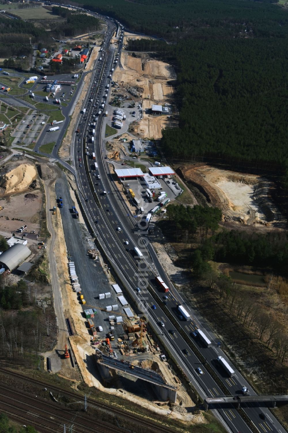 Michendorf from above - Motorway Construction and wheel spacers along the route of the motorway A10 to 8-lane track extension in Michendorf in Brandenburg