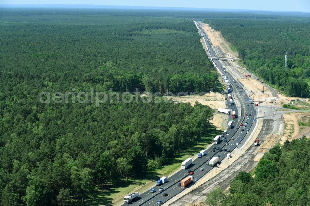 Michendorf from the bird's eye view: Motorway Construction and wheel spacers along the route of the motorway A10 to 8-lane track extension in Michendorf in Brandenburg