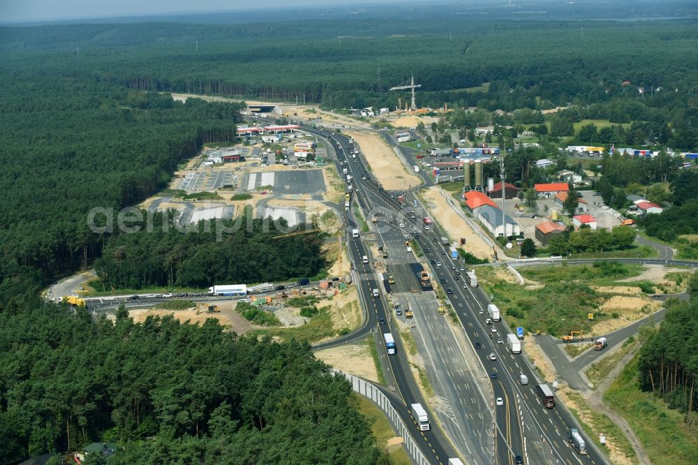 Michendorf from the bird's eye view: Motorway Construction and wheel spacers along the route of the motorway A10 to 8-lane track extension in Michendorf in Brandenburg