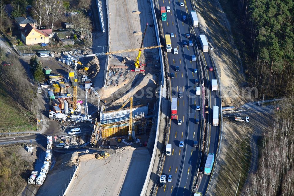 Michendorf from the bird's eye view: Motorway Construction and wheel spacers along the route of the motorway A10 to 8-lane track extension in Michendorf in Brandenburg