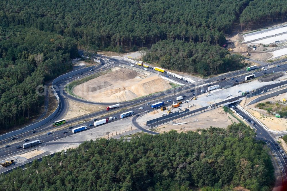 Michendorf from the bird's eye view: Motorway Construction and wheel spacers along the route of the motorway A10 to 8-lane track extension in Michendorf in Brandenburg