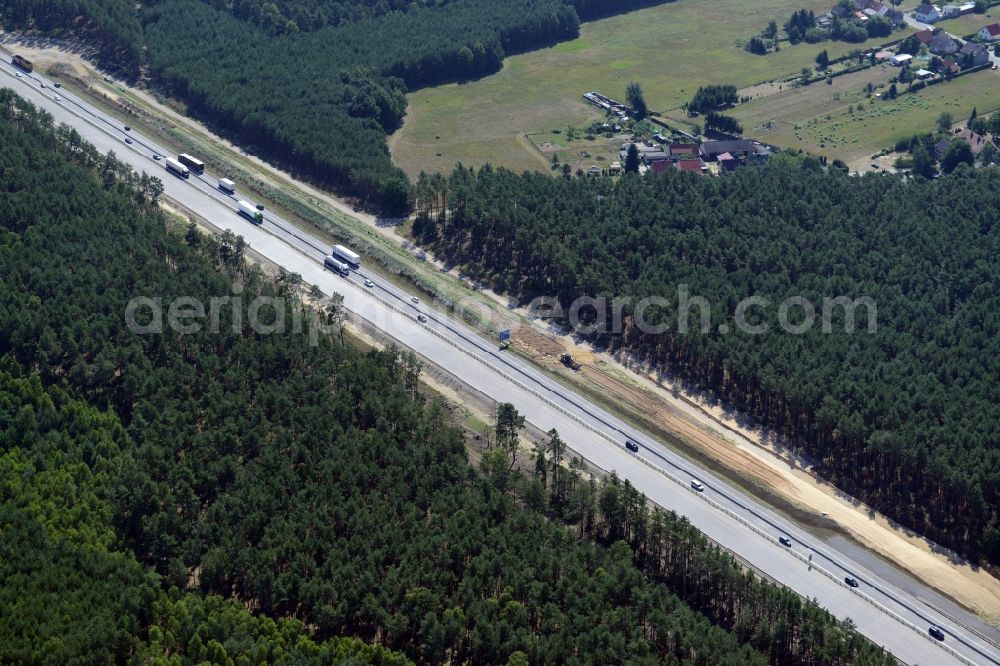 Friedrichshof from the bird's eye view: Highway construction site for the expansion and extension of track along the route of A12 E30 in Friedrichshof in the state Brandenburg