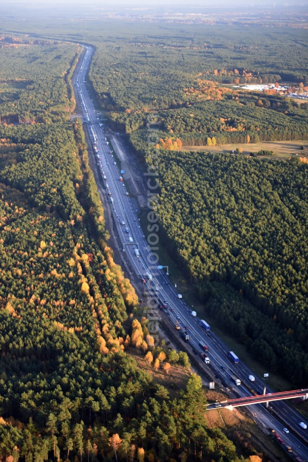 Friedrichshof from the bird's eye view: Highway construction site for the expansion and extension of track along the route of A12 E30 in Friedrichshof in the state Brandenburg