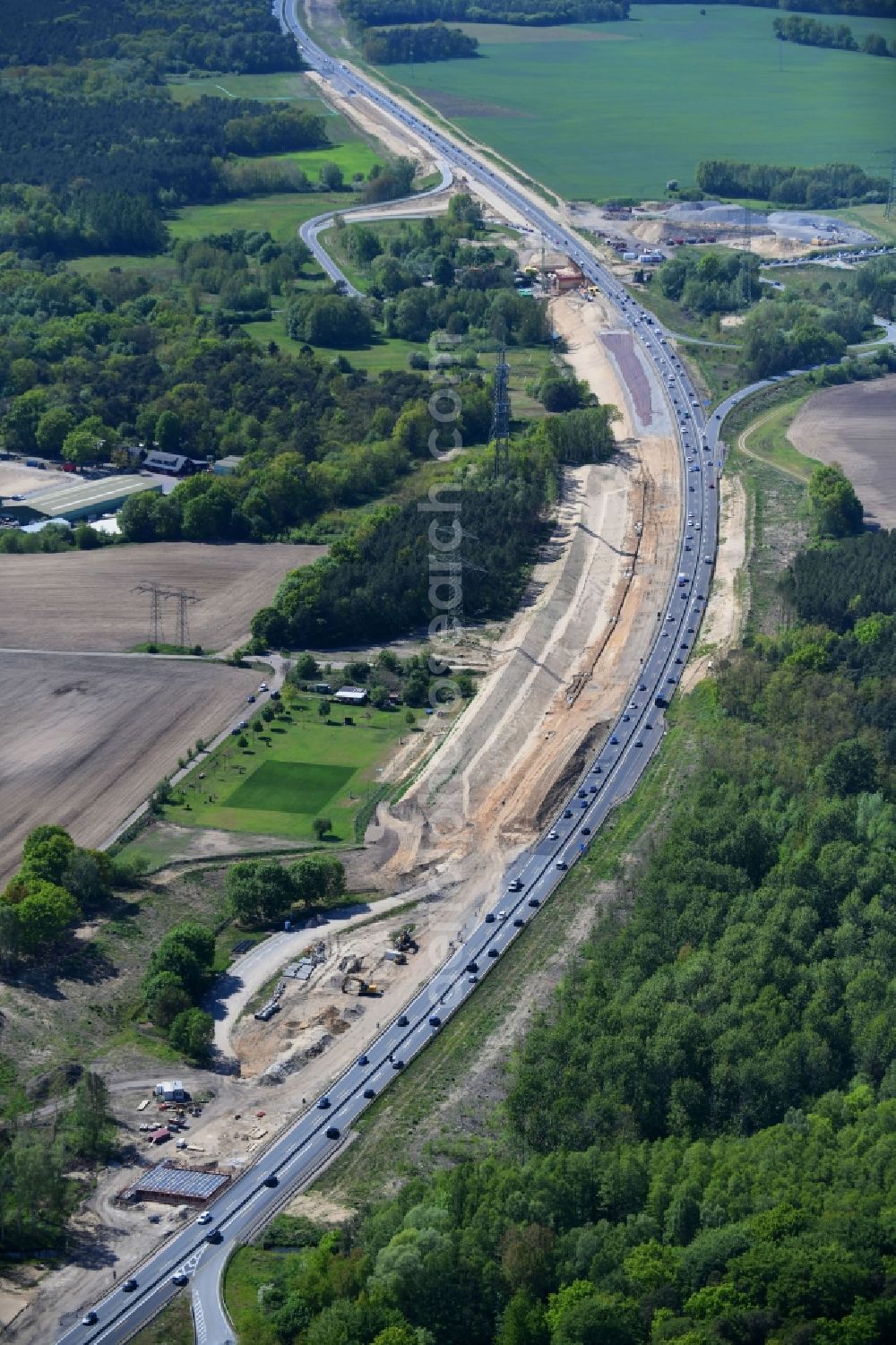 Aerial image Mühlenbecker Land - Highway- Construction site with earthworks along the route and of the route of the highway of BAB 10 in Muehlenbecker Land in the state Brandenburg, Germany