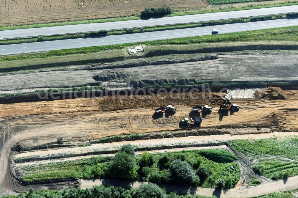 Espenhain from the bird's eye view: Highway- Construction site with earthworks along the route and of the route of the highway route B95 to A72 motorway in Espenhain in the state Saxony