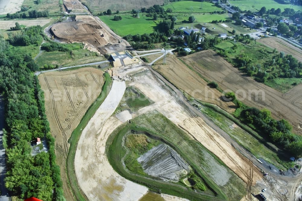 Kesselhain from the bird's eye view: Highway- Construction site with earthworks along the route and of the route of the highway route B95 to A72 motorway in Kesselhain in the state Saxony