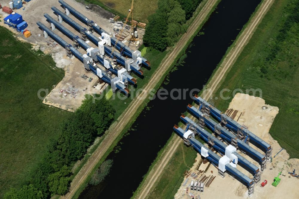 Fresenbrügge from the bird's eye view: Highway- Construction site with earthworks along the route and of the route of the highway bridge Eldebruecke on federal- motorway BAB A14 in Fresenbruegge in the state Mecklenburg - Western Pomerania