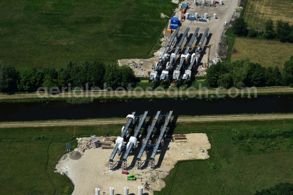 Fresenbrügge from the bird's eye view: Highway- Construction site with earthworks along the route and of the route of the highway bridge Eldebruecke on federal- motorway BAB A14 in Fresenbruegge in the state Mecklenburg - Western Pomerania