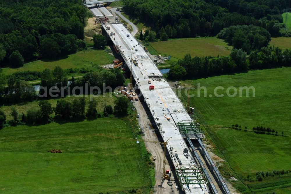 Grabow from above - Highway- Construction site with earthworks along the route and of the route of the highway bridge Eldebruecke on federal- motorway BAB A14 in Fresenbruegge in the state Mecklenburg - Western Pomerania