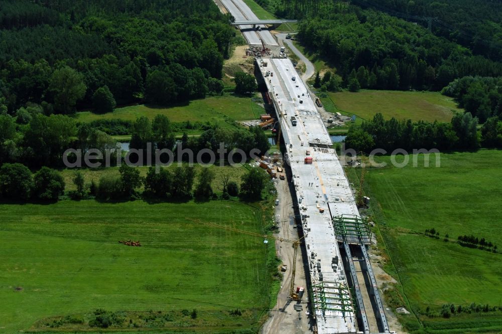 Grabow from the bird's eye view: Highway- Construction site with earthworks along the route and of the route of the highway bridge Eldebruecke on federal- motorway BAB A14 in Fresenbruegge in the state Mecklenburg - Western Pomerania