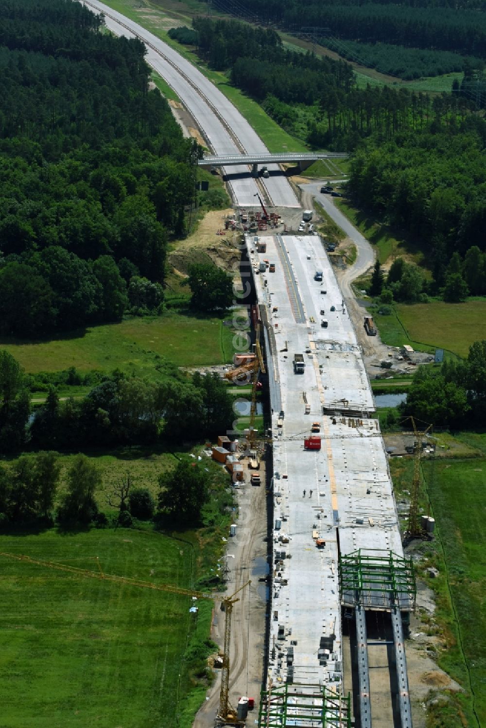 Aerial image Grabow - Highway- Construction site with earthworks along the route and of the route of the highway bridge Eldebruecke on federal- motorway BAB A14 in Fresenbruegge in the state Mecklenburg - Western Pomerania