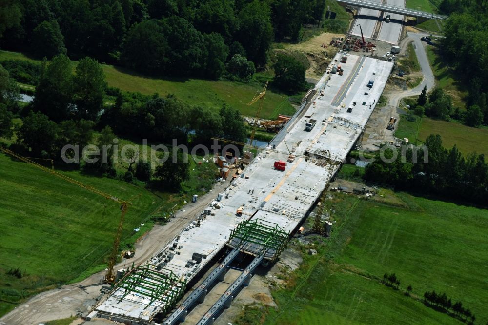 Grabow from the bird's eye view: Highway- Construction site with earthworks along the route and of the route of the highway bridge Eldebruecke on federal- motorway BAB A14 in Fresenbruegge in the state Mecklenburg - Western Pomerania