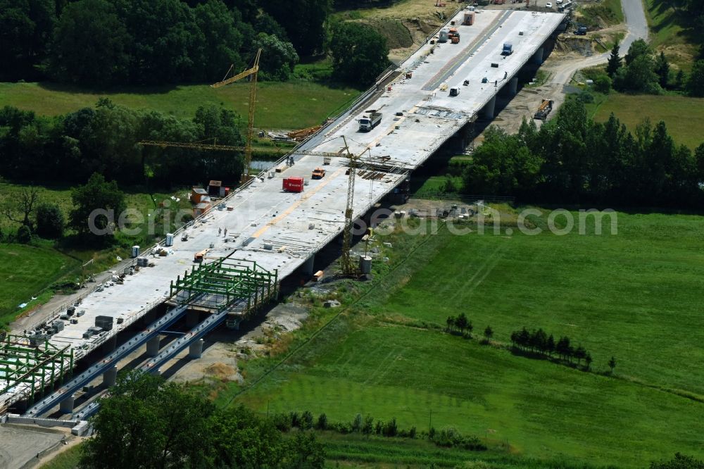 Aerial image Grabow - Highway- Construction site with earthworks along the route and of the route of the highway bridge Eldebruecke on federal- motorway BAB A14 in Fresenbruegge in the state Mecklenburg - Western Pomerania