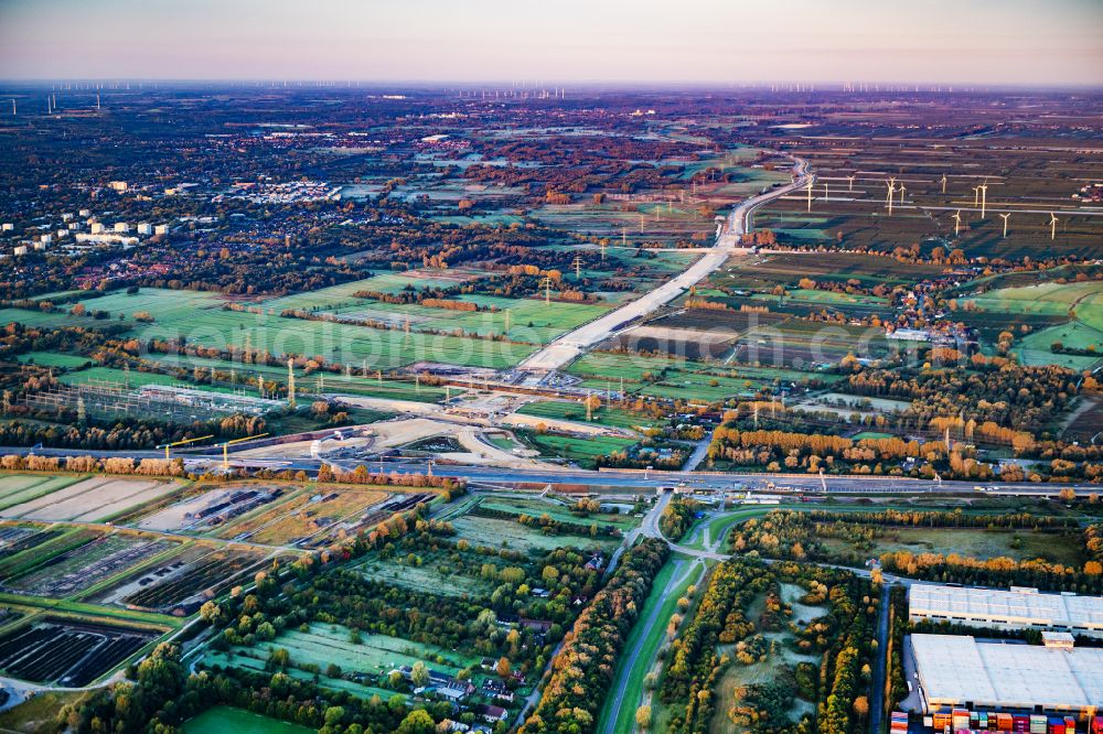 Hamburg from the bird's eye view: Motorway- Construction site with earthworks along the route and of the route of the highway der A26 West on street E45 in the district Moorburg in Hamburg, Germany