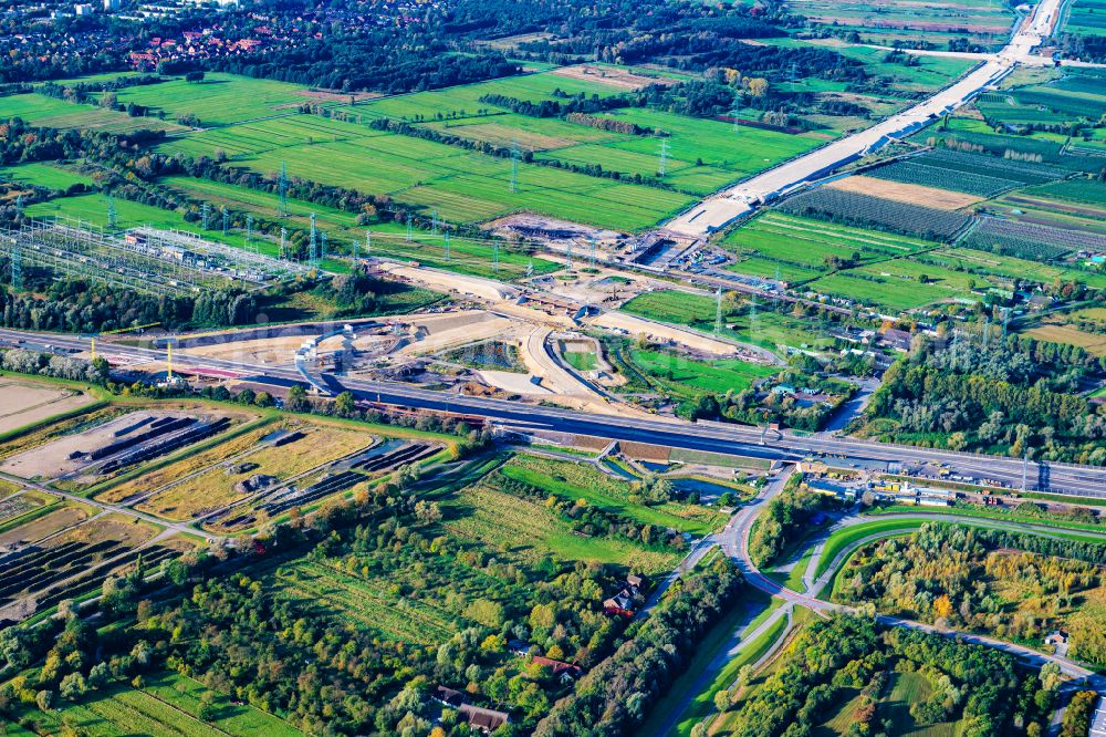 Hamburg from the bird's eye view: Motorway- Construction site with earthworks along the route and of the route of the highway der A26 West on street E45 in the district Moorburg in Hamburg, Germany