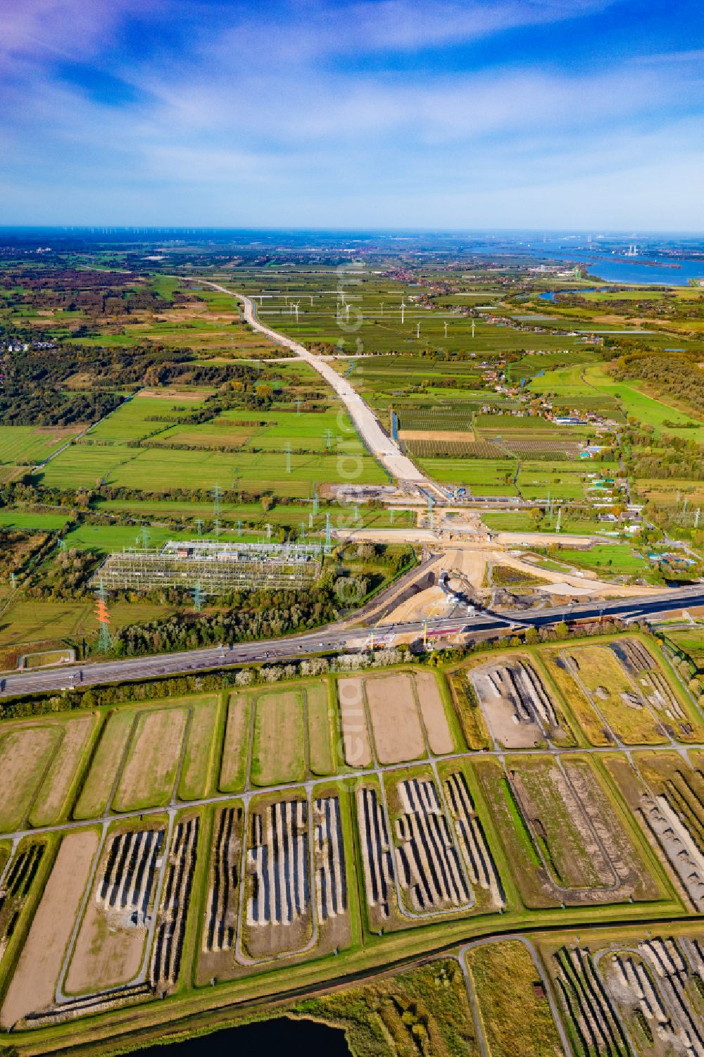 Aerial image Hamburg - Motorway- Construction site with earthworks along the route and of the route of the highway der A26 West on street E45 in the district Moorburg in Hamburg, Germany