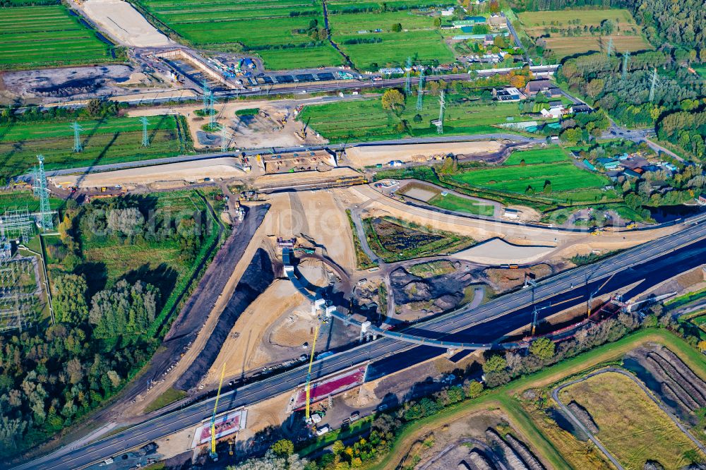 Aerial photograph Hamburg - Motorway- Construction site with earthworks along the route and of the route of the highway der A26 West on street E45 in the district Moorburg in Hamburg, Germany