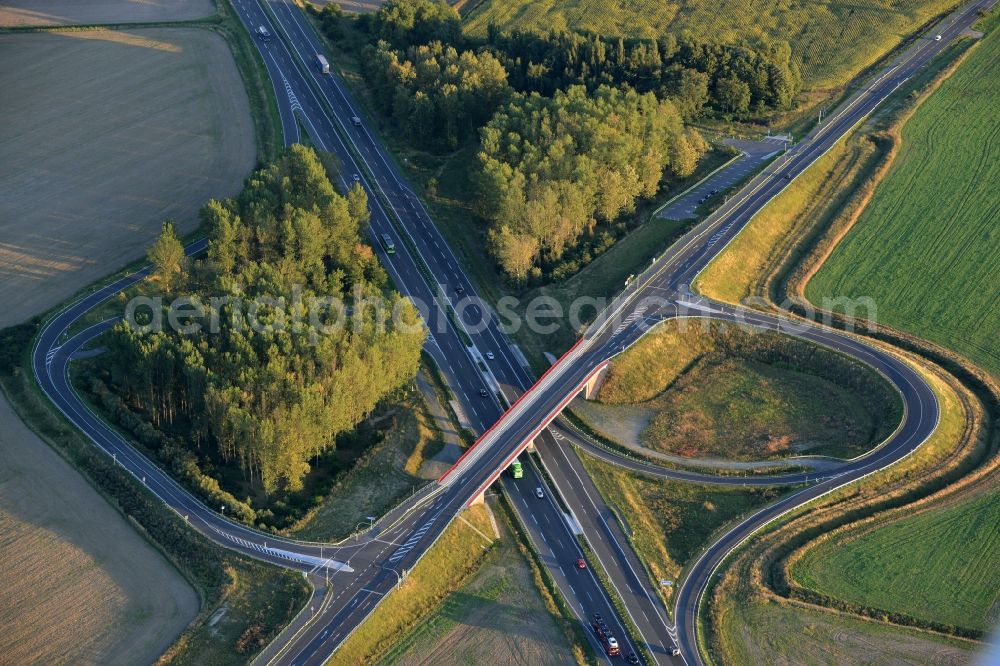 Aerial image Fehrbellin - Routing and traffic lanes over the highway bridge in the motorway A at the exit Neuruppin-Sued in Fehrbellin in the state Brandenburg