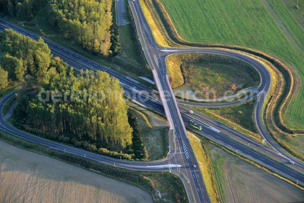 Fehrbellin from above - Routing and traffic lanes over the highway bridge in the motorway A at the exit Neuruppin-Sued in Fehrbellin in the state Brandenburg