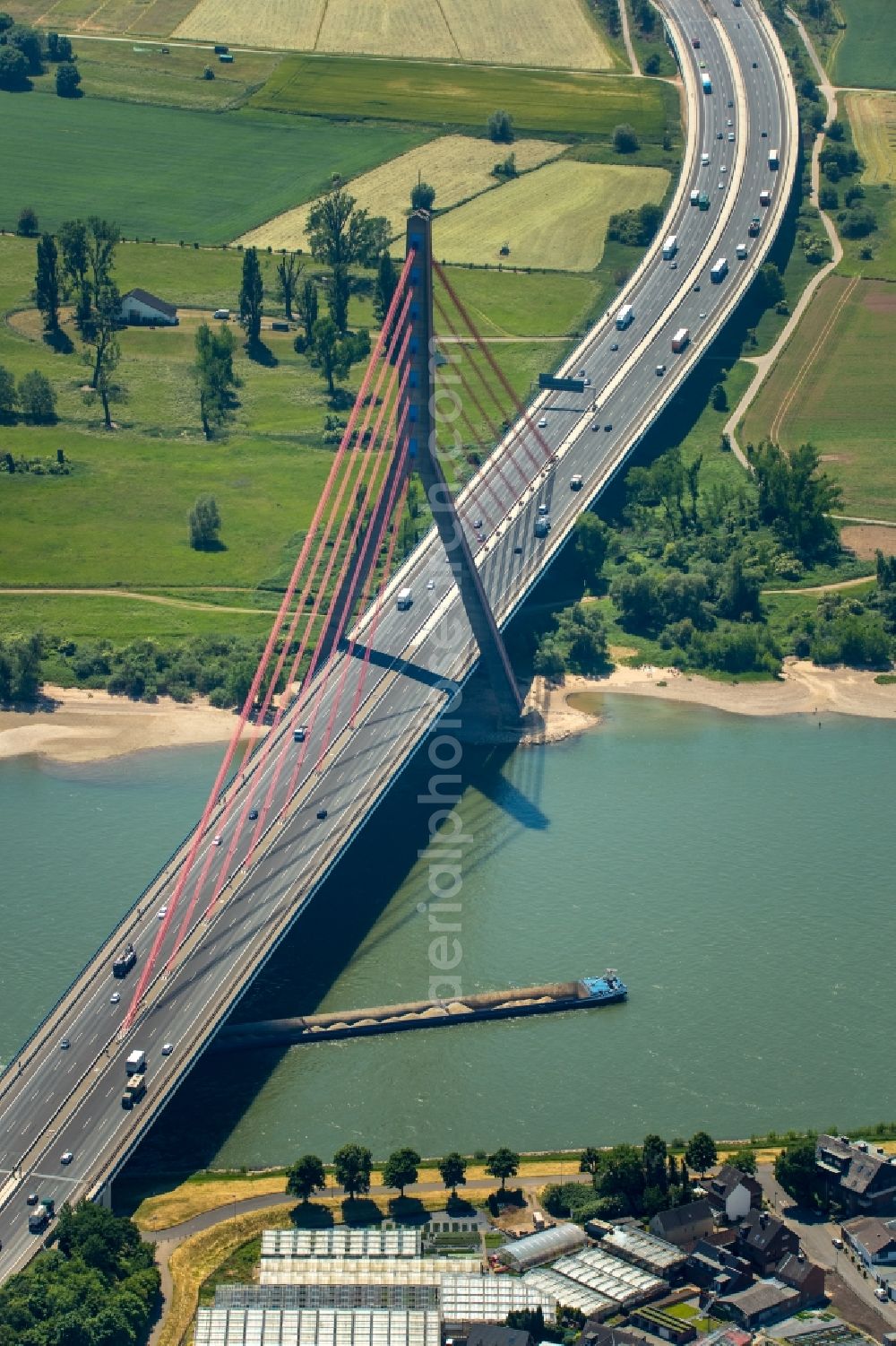 Düsseldorf from the bird's eye view: Construction site for the new building of Routing and traffic lanes over the highway bridge in the motorway A 46 - also called also called Rheinbruecke Duesseldorf-Flehe in the district Flehe in Duesseldorf in the state North Rhine-Westphalia, Germany