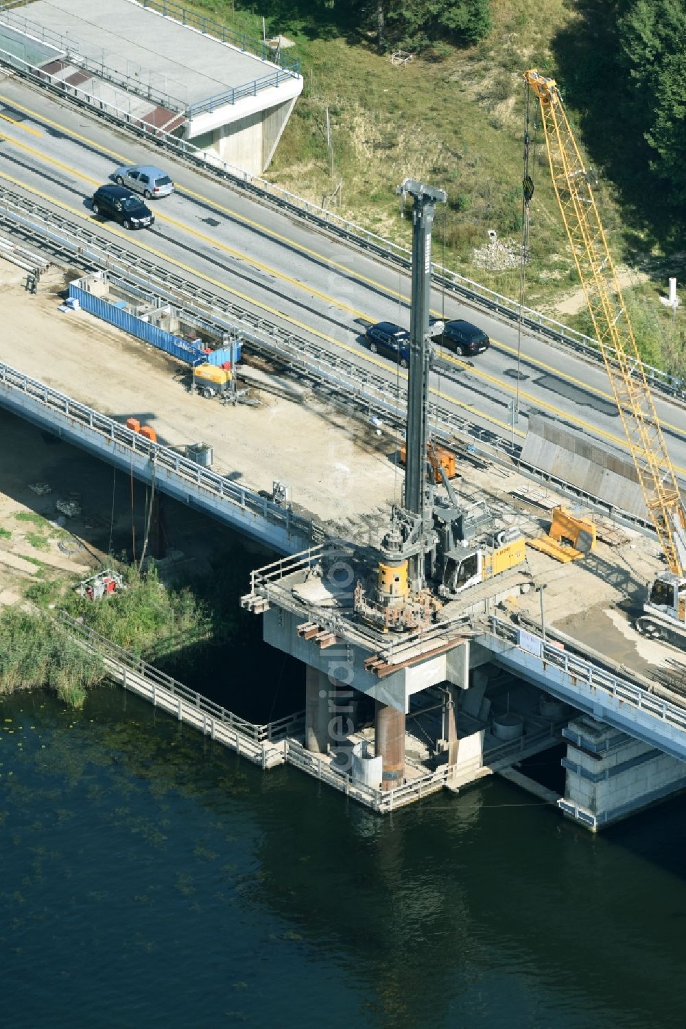 Petersdorf from above - Routing and traffic lanes over the highway bridge in the motorway A 19 and new construction site in Petersdorf in the state Mecklenburg - Western Pomerania