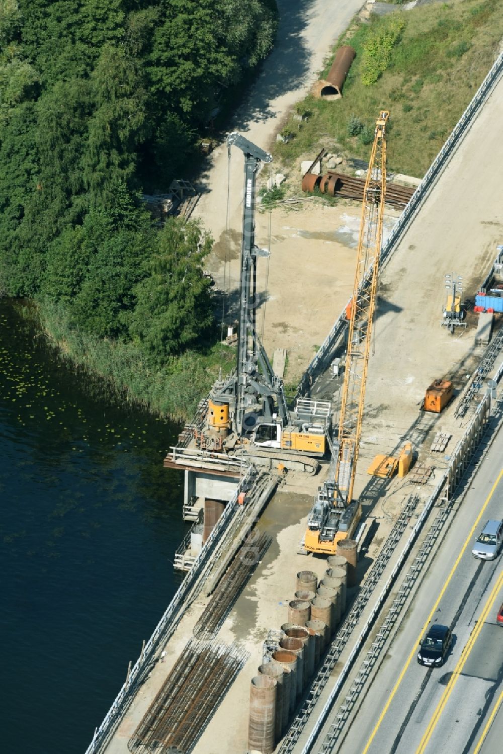 Aerial photograph Petersdorf - Routing and traffic lanes over the highway bridge in the motorway A 19 and new construction site in Petersdorf in the state Mecklenburg - Western Pomerania