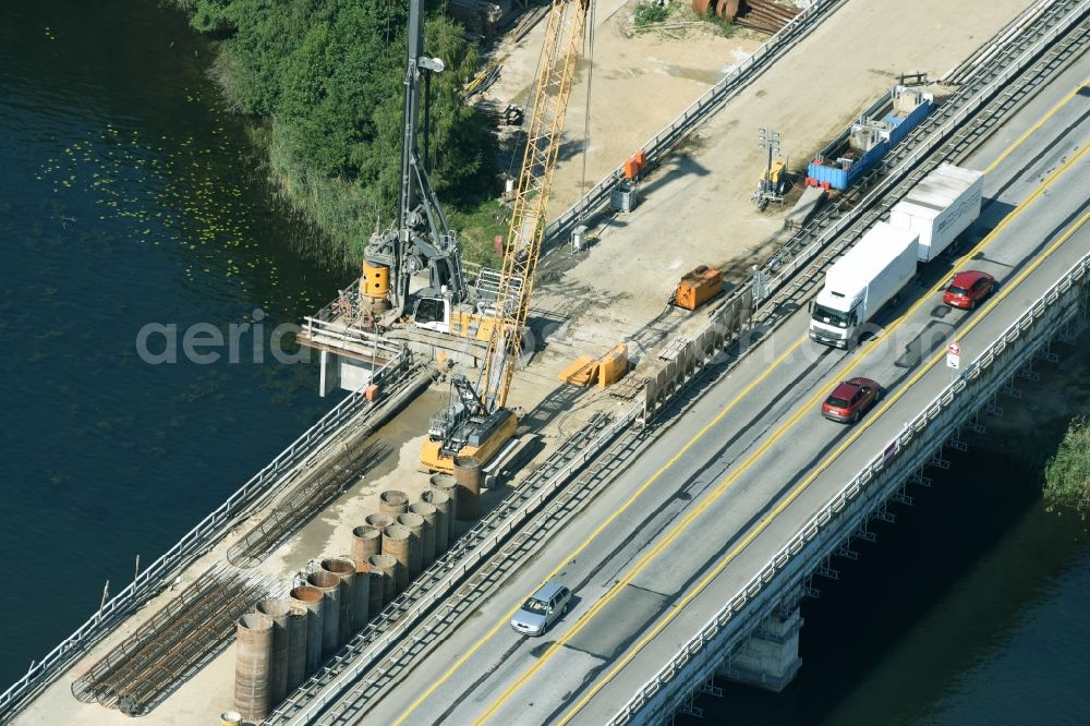 Petersdorf from above - Routing and traffic lanes over the highway bridge in the motorway A 19 and new construction site in Petersdorf in the state Mecklenburg - Western Pomerania