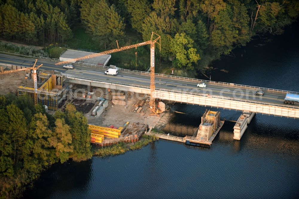 Aerial image Petersdorf - Routing and traffic lanes over the highway bridge in the motorway A 19 and new construction site in Petersdorf in the state Mecklenburg - Western Pomerania