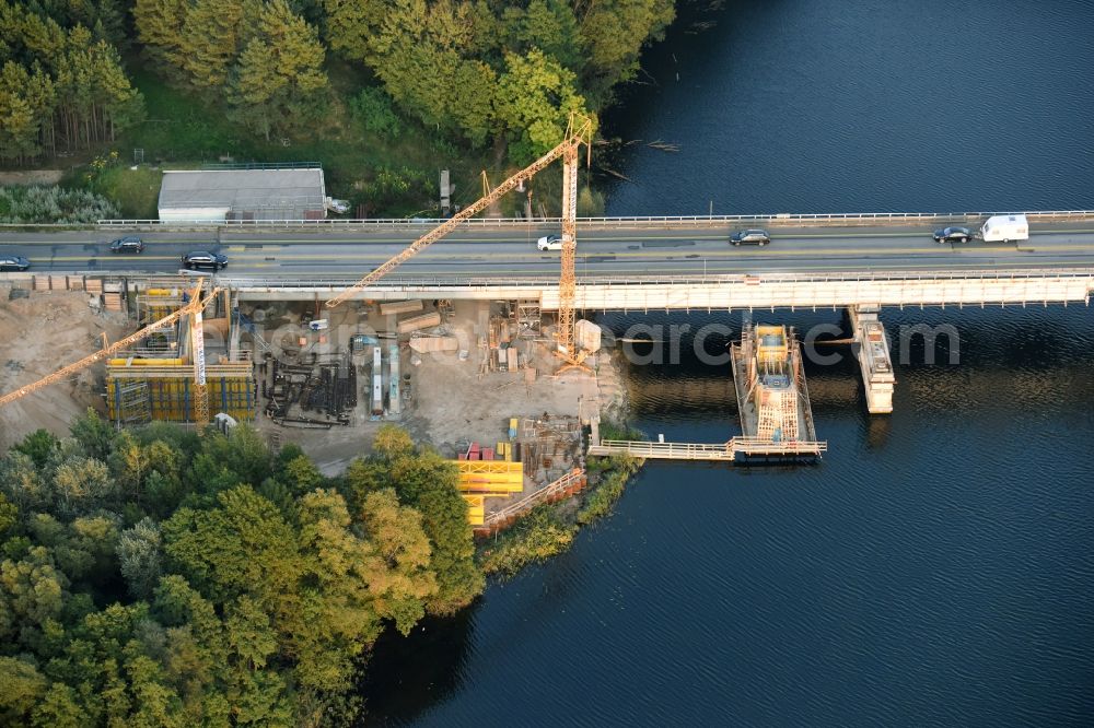 Petersdorf from above - Routing and traffic lanes over the highway bridge in the motorway A 19 and new construction site in Petersdorf in the state Mecklenburg - Western Pomerania