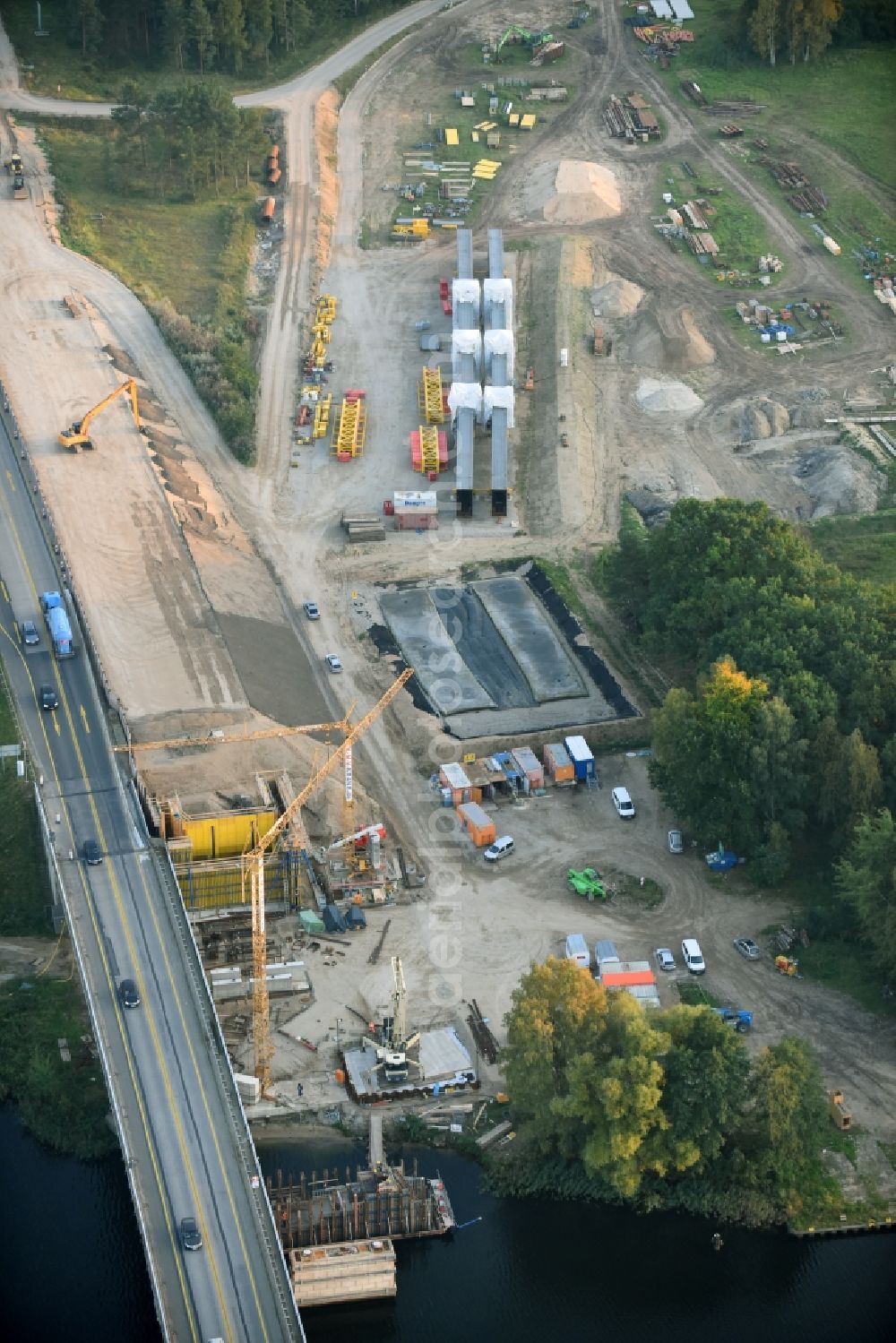 Petersdorf from above - Routing and traffic lanes over the highway bridge in the motorway A 19 and new construction site in Petersdorf in the state Mecklenburg - Western Pomerania