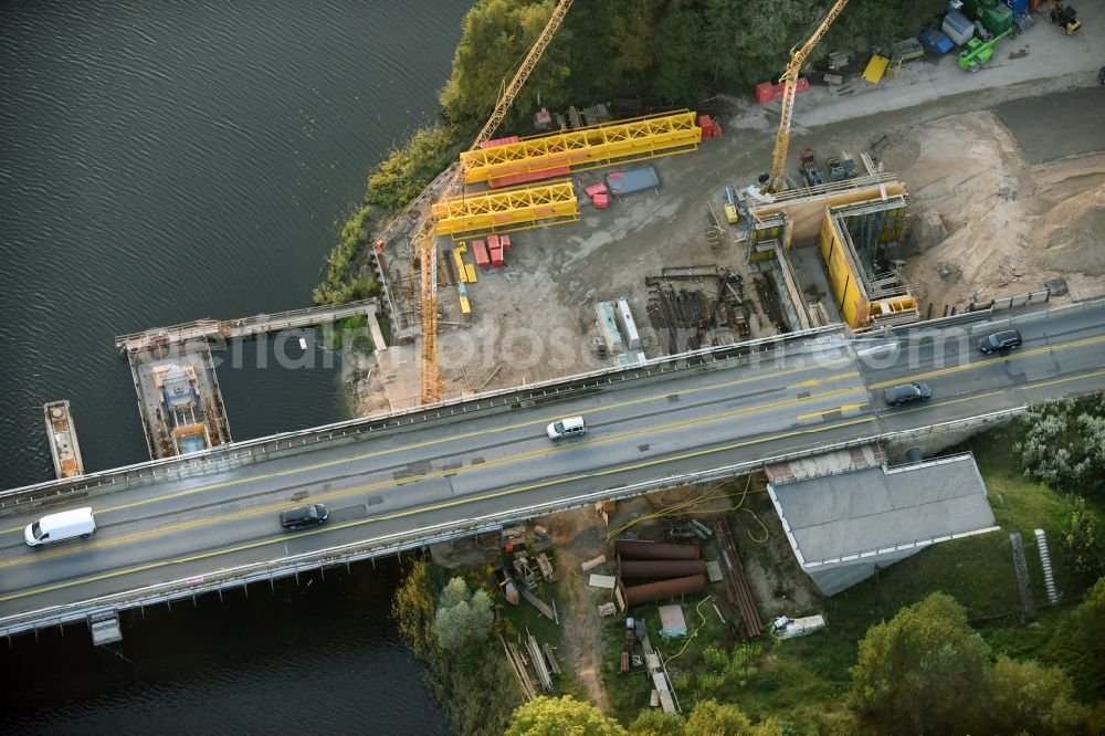 Aerial image Petersdorf - Routing and traffic lanes over the highway bridge in the motorway A 19 and new construction site in Petersdorf in the state Mecklenburg - Western Pomerania