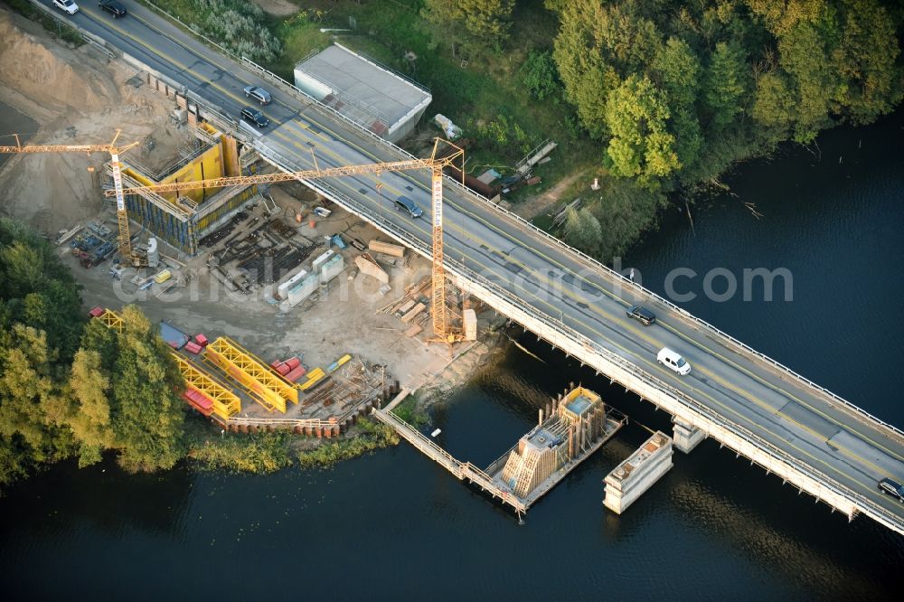 Petersdorf from above - Routing and traffic lanes over the highway bridge in the motorway A 19 and new construction site in Petersdorf in the state Mecklenburg - Western Pomerania