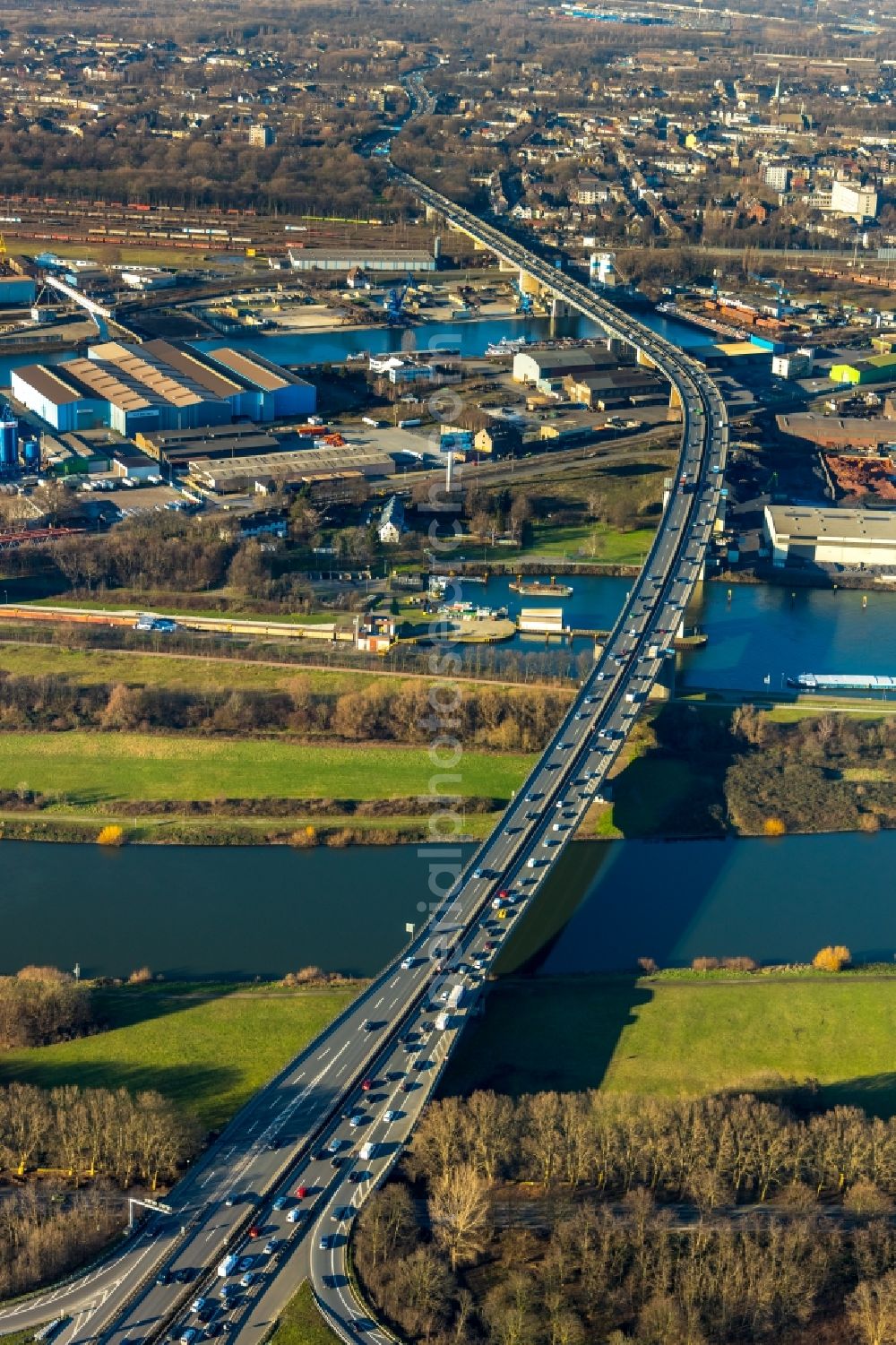 Duisburg from above - Routing and traffic lanes over the highway bridge in the motorway A 59 over the Rhine river course in Duisburg in the state North Rhine-Westphalia, Germany