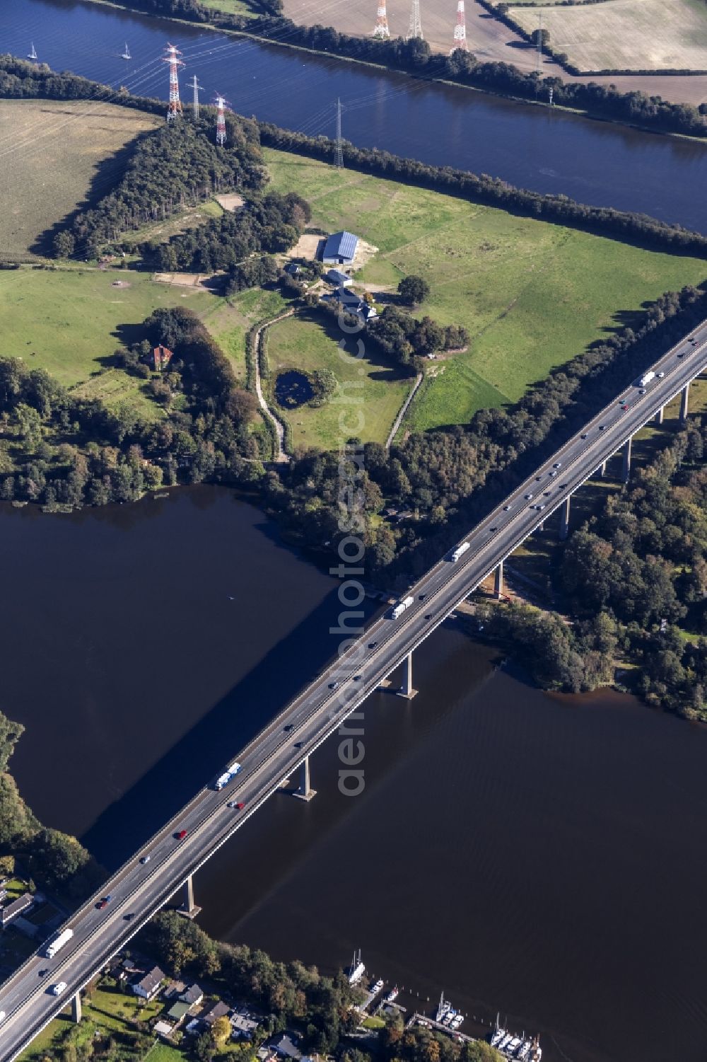 Aerial image Rade - Routing and traffic lanes over the highway bridge in the motorway A 7 in the district Lehmbek in Rade in the state Schleswig-Holstein