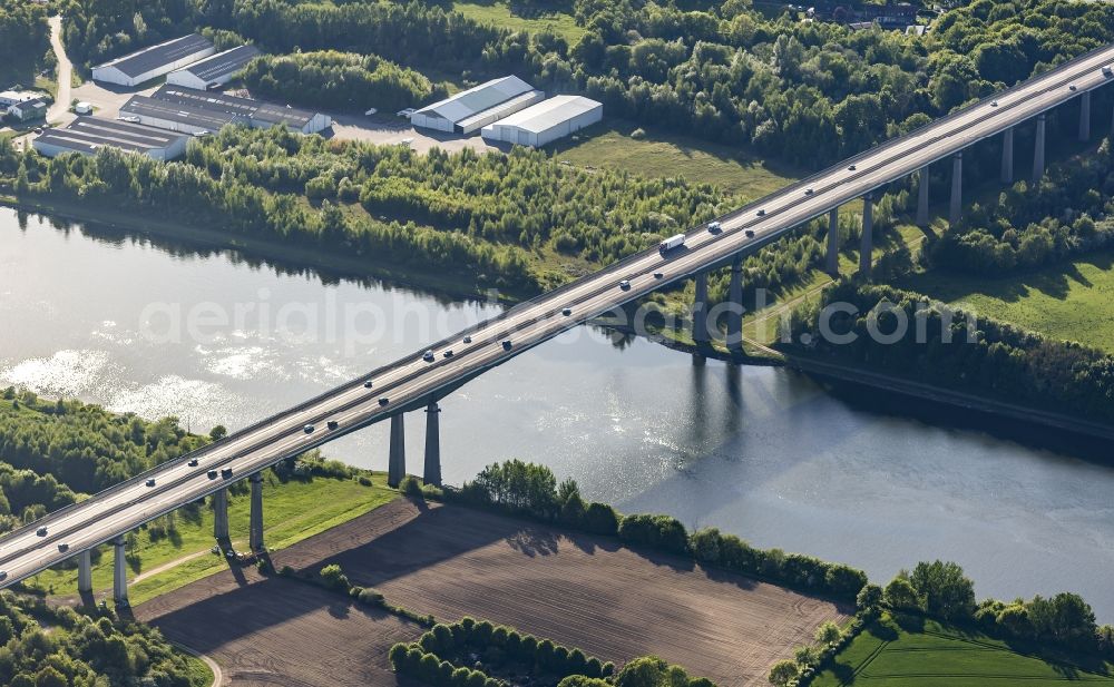 Rade from the bird's eye view: Routing and traffic lanes over the highway bridge in the motorway A 7 in Rade in the state Schleswig-Holstein, Germany