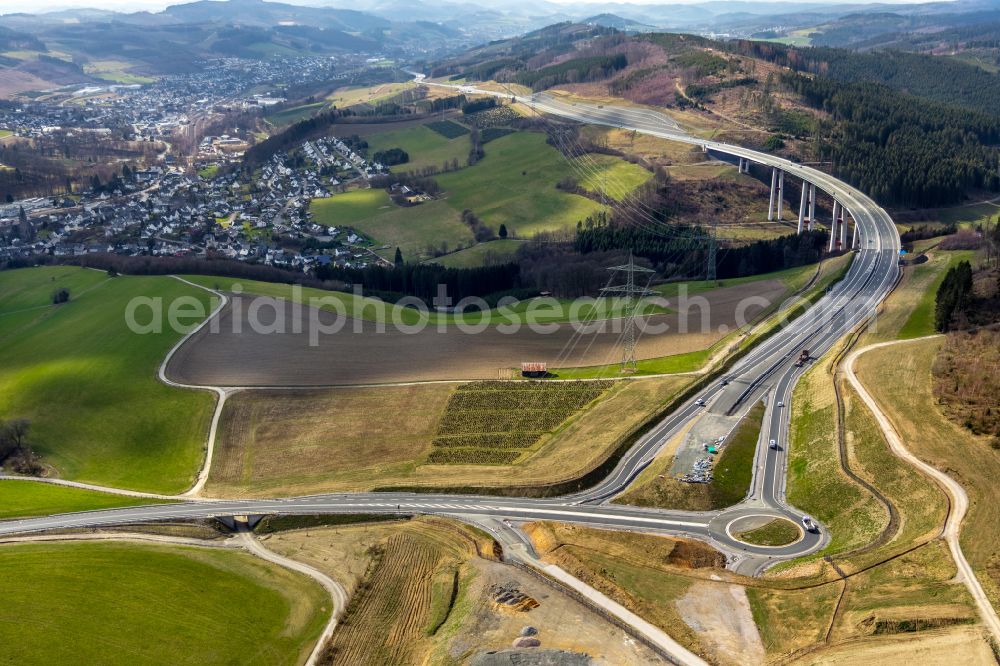 Nuttlar from above - Routing and traffic lanes over the highway bridge in the motorway A 46 Talbruecke Nuttlar in Nuttlar at Sauerland in the state North Rhine-Westphalia, Germany