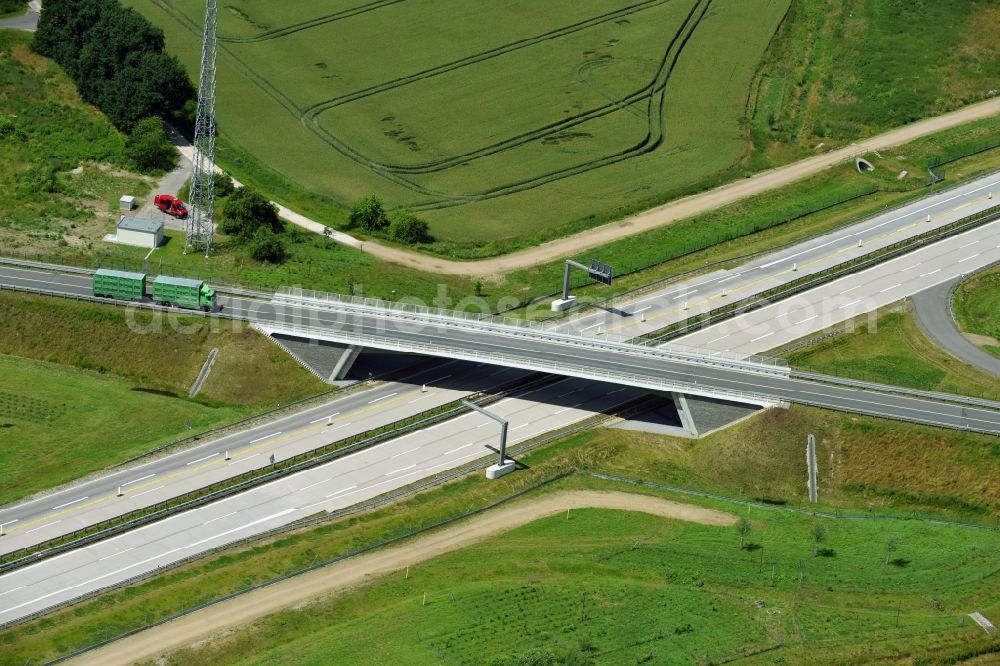 Aerial image Karstädt - Routing and traffic lanes over the highway bridge in the motorway A 14 to the Landstrasse L131 in Karstaedt in the state Brandenburg, Germany