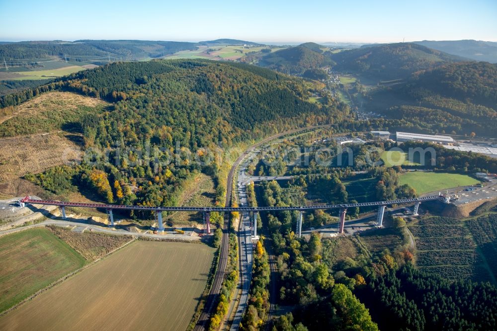 Bestwig from the bird's eye view: Routing and traffic lanes over the highway bridge at the federal highway B7 between Duemel and Olsberg in Bestwig in the state North Rhine-Westphalia