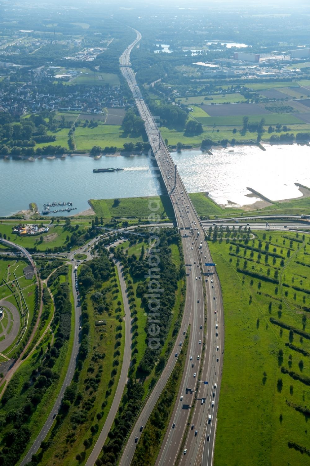 Leverkusen from above - Routing and traffic lanes over the highway bridge over the river Rhine in the motorway A1 in Leverkusen in the state of North Rhine-Westphalia. View from the East