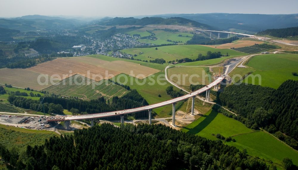 Bestwig from the bird's eye view: Routing and traffic lanes over the new building of the highway bridge in the motorway A46 in Bestwig in the state North Rhine-Westphalia